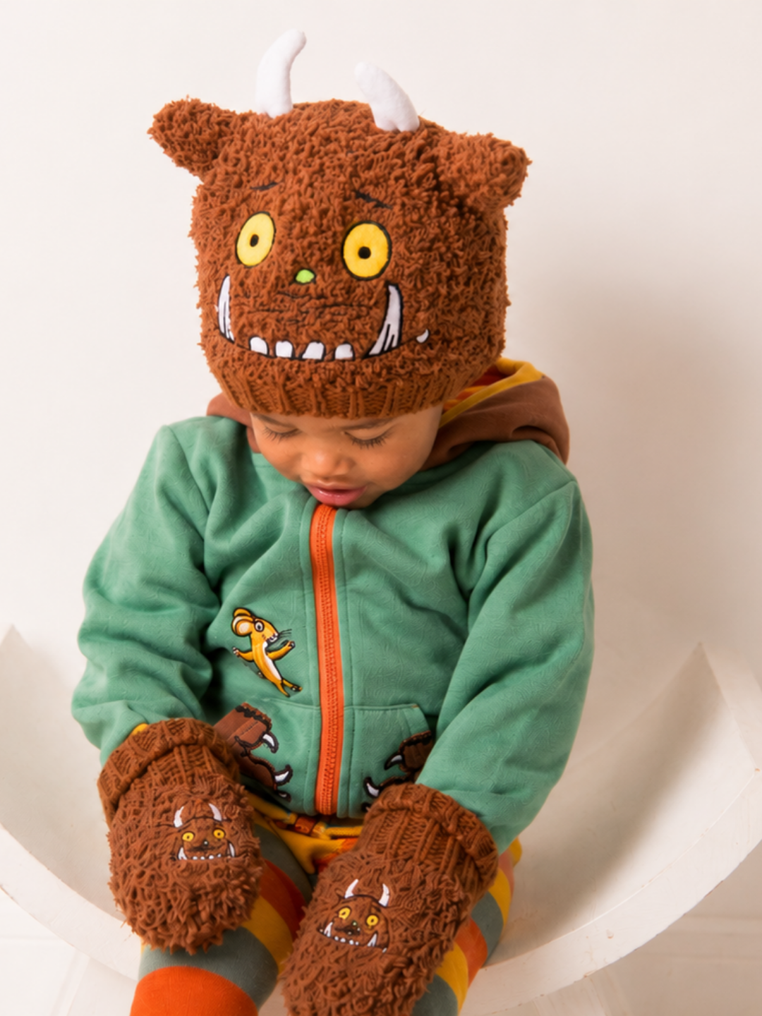 Child wearing Gruffalo™ mittens with the matching Gruffalo™ winter hat