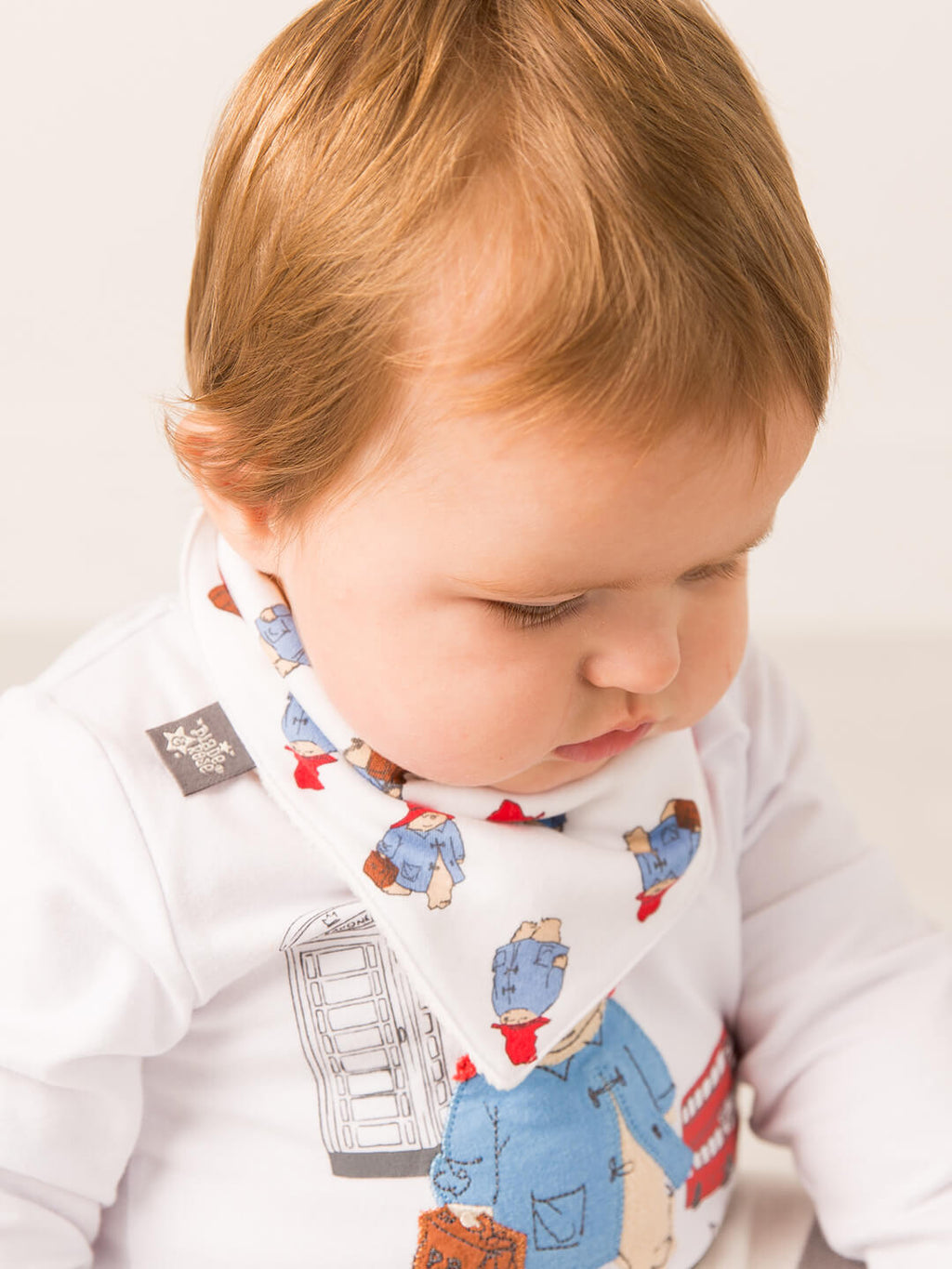 Paddington™ Loves to Travel Bib