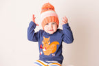 Coral and Cream Striped Bobble Hat