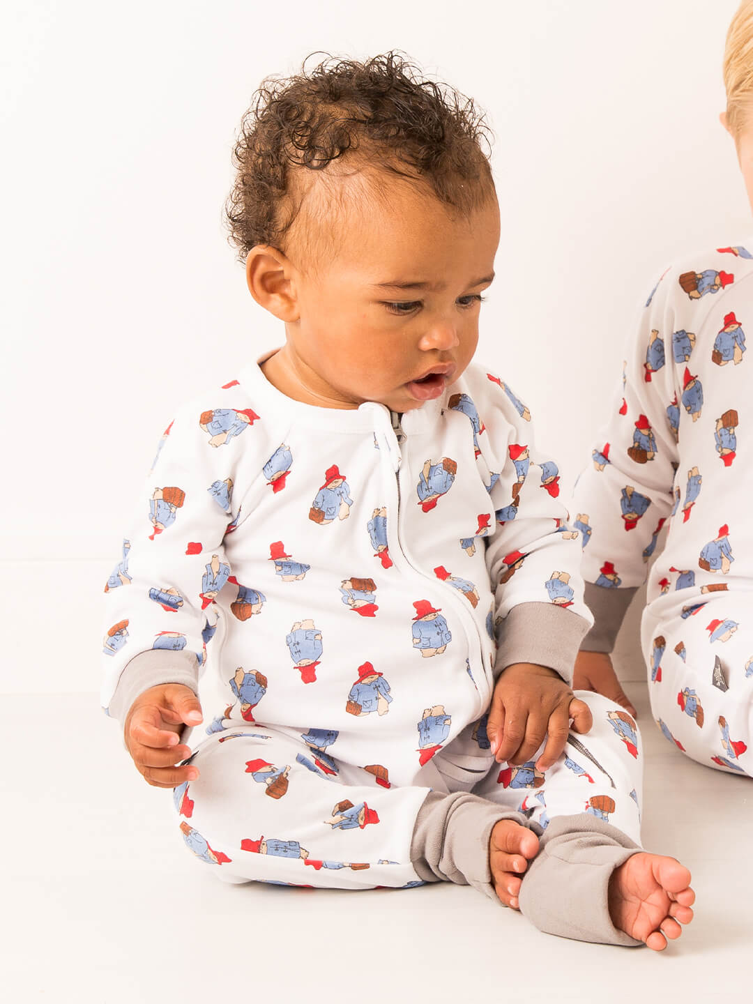 Paddington™ Loves to Travel Zip-Up Romper Playsuit