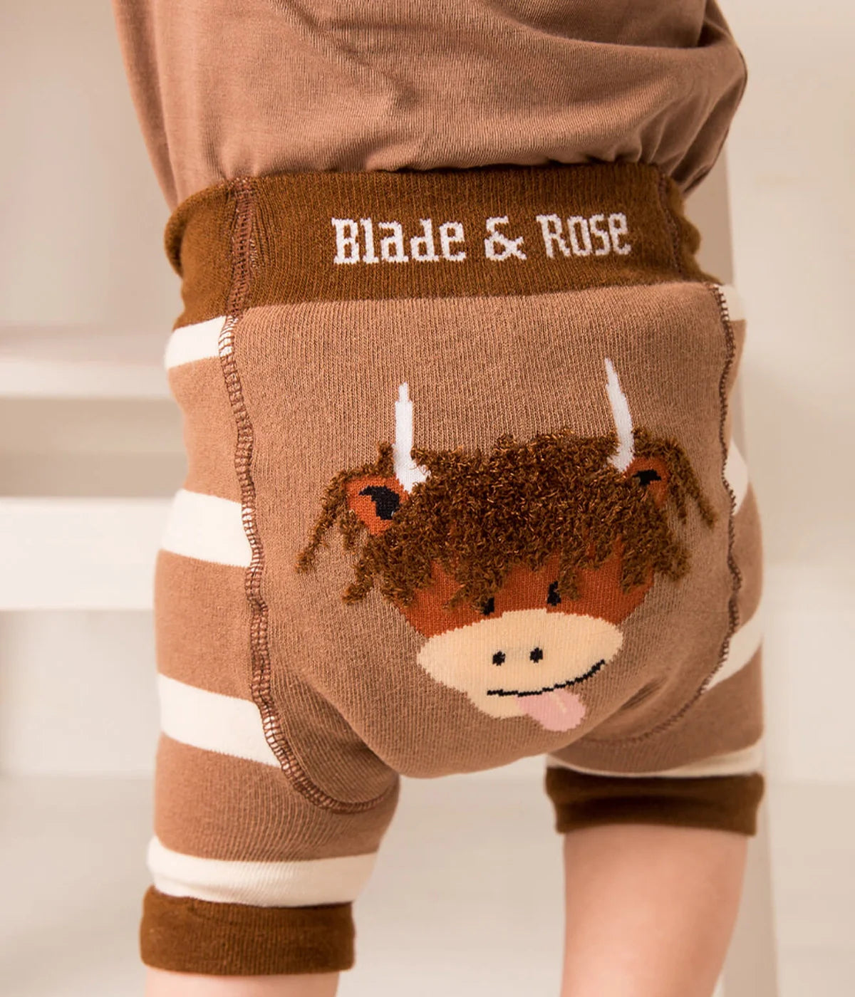 Pantaloncini neutri di mucca Highland