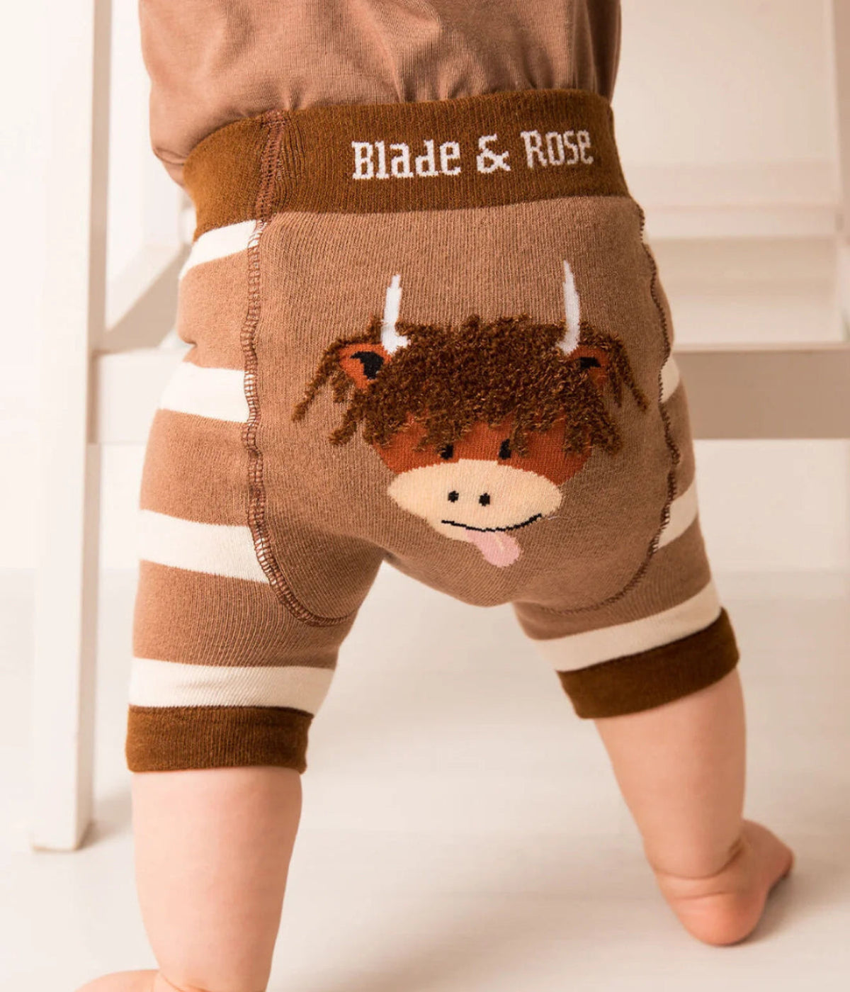 Pantaloncini neutri di mucca Highland